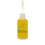 Dropper pipette releasing Daylight Facial Oil into the bottle