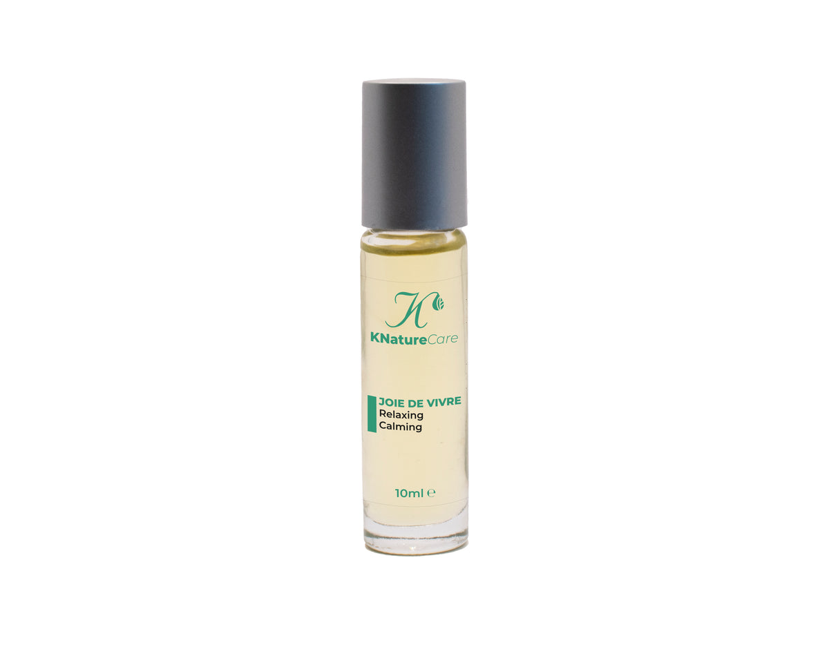 Joie De Vivre Aromatherapy Roll On bottle on a plain background