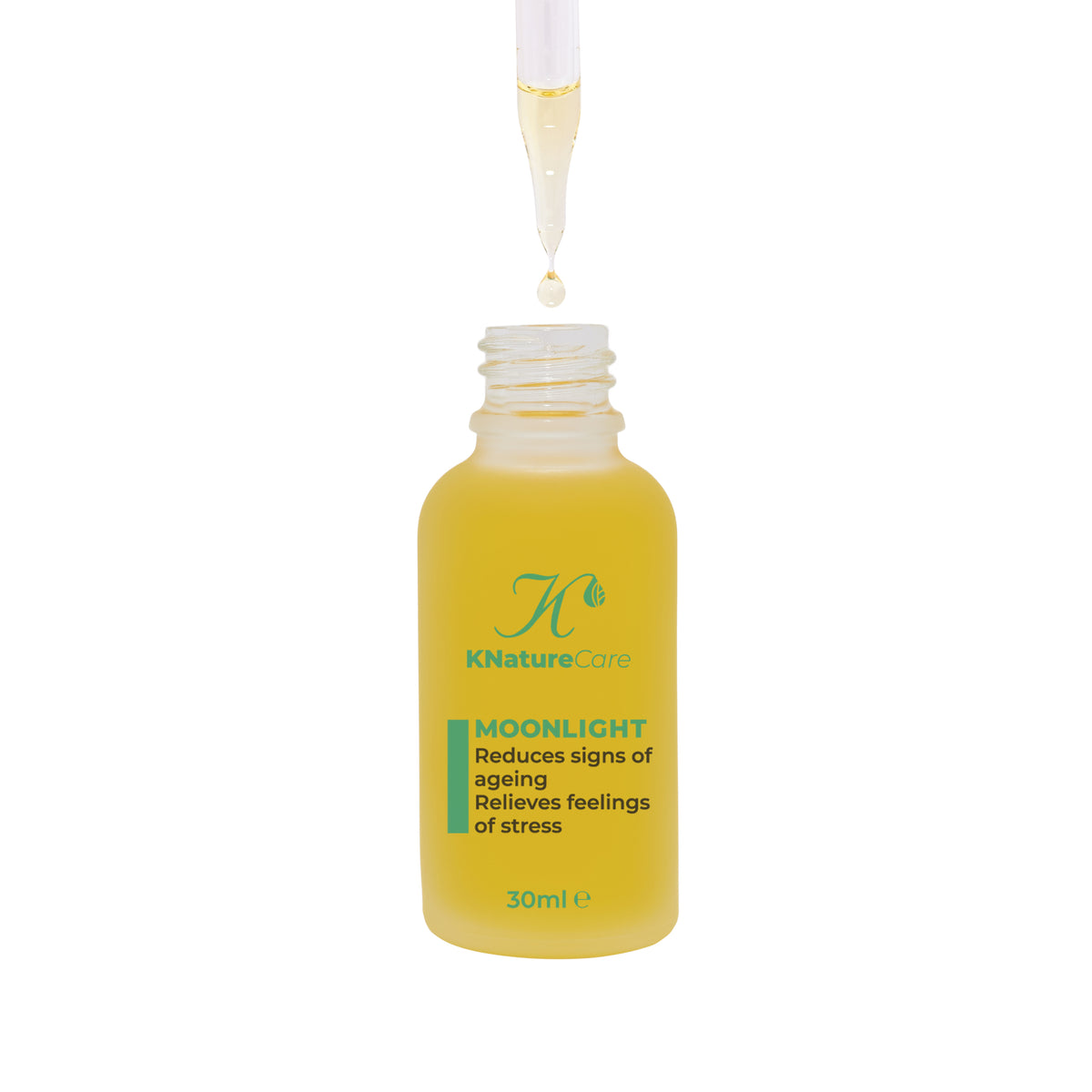 Dropper pipette releasing Moonlight Night Facial Oil into the bottle